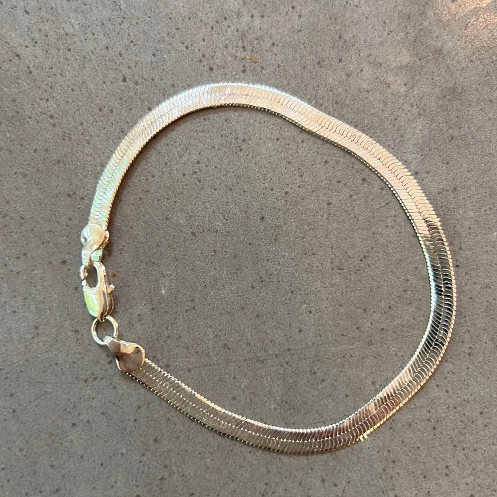 Silver tone herringbone bracelet